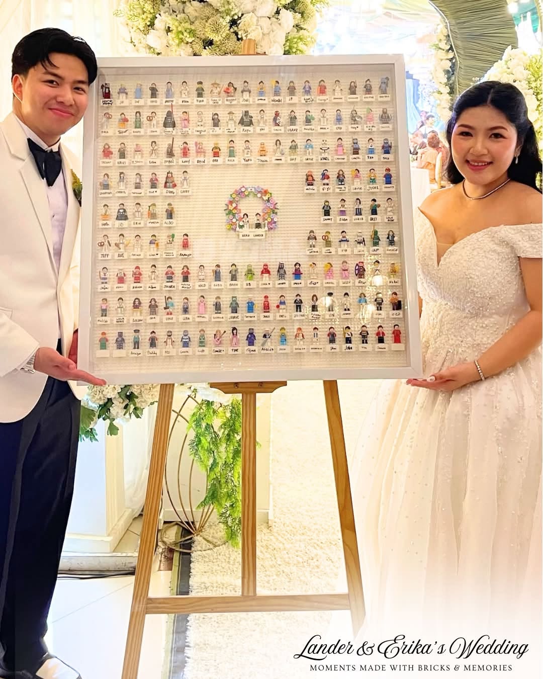 Lander & Erika holding their finished Minifigure Guestbook Frame